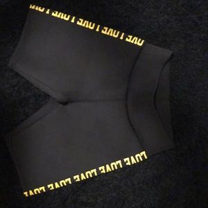 Black biker shorts love printed on the side